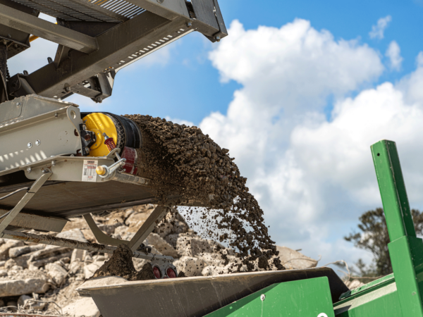 Material moving along the conveyor belt.